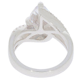 Elegant pear white moissanite sterling silver ring showcasing intricate design and brilliant gemstone from the back angle.